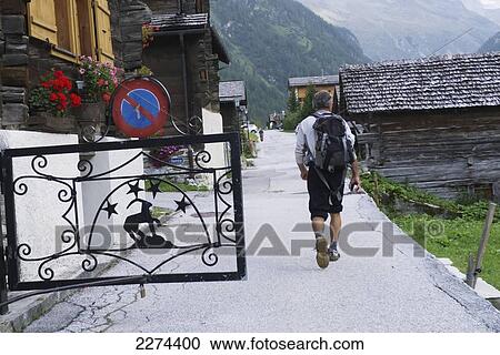 Stock Image - Switzerland, Val d'Anniviers, 675 m in the Swiss Alps. Typical wooden Swiss chalets; Zinal, Small mountain resort that lies at an altitude of 1. Fotosearch