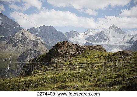 Stock Photo - Switzerland, Val d'Anniviers, At the Col de Sorebois above Zinal with the Weisshorn in the distance; Zinal. Fotosearch