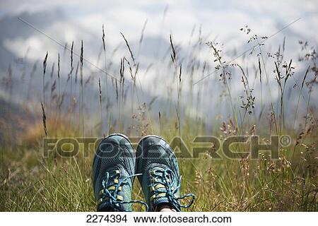 Switzerland, Val d'Anniviers, Merrell barefoot shoes and mountains in background; Zinal View Large Photo Image Picture - Switzerland, Val d'Anniviers, Merrell barefoot shoes and mountains in background; Zinal. Fotosearch