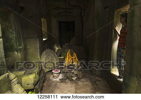 Ta Prohm, impressive temple in Angkor area built in twelfth century; Siem Reap, Cambodia View Large Photo Image Stock Image - Ta Prohm, impressive temple in Angkor area built in twelfth century; Siem Reap, Cambodia. Fotosearch