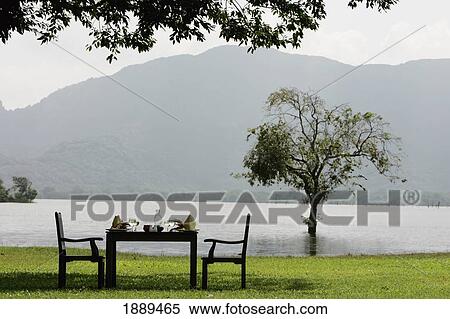 Table And Chairs Ready For Lunch Beside Amaya Lake View Large Photo Image Stock Photography - Table And Chairs Ready For Lunch Beside Amaya Lake. Fotosearch