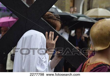 Stock Photo - Tableau Vivant, Jesus Carrying The Cross, Italian Procession, July, Clerkenwell, London, Uk. Fotosearch