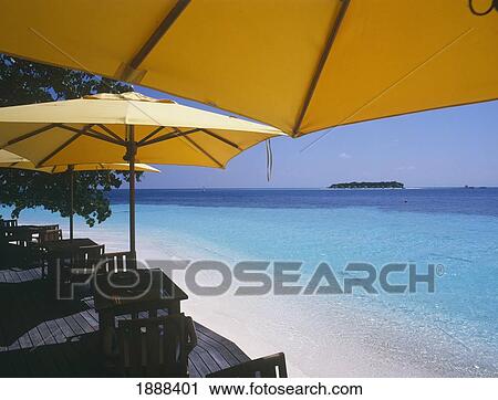 Tables And Umbrellas On Beach View Large Photo Image Stock Image - Tables And Umbrellas On Beach. Fotosearch