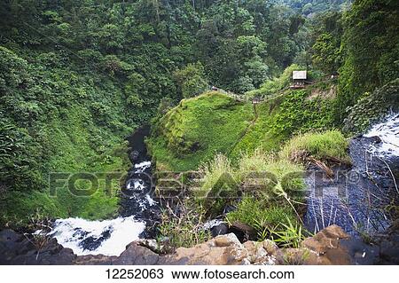 Stock Image - Tad Yuang waterfalls located in the Bolaven Plateau; Laos. Fotosearch