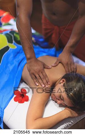 Tahitian Masseuse Giving A Massage; Moorea Island Society Islands French Polynesia South Pacific View Large Photo Image Stock Photography - Tahitian Masseuse Giving A Massage; Moorea Island Society Islands French Polynesia South Pacific. Fotosearch