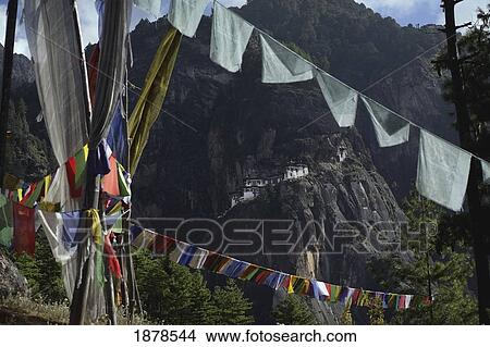 Picture - Taktsang Monastery And Prayer Flags. Fotosearch