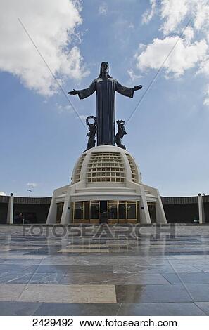 Stock Image - Tall Jesus Christ statue surrounded by marble floor; Silao, Guanajuato, Mexico. Fotosearch