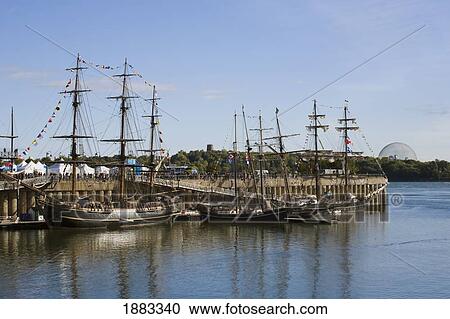 Stock Image - Tall Sailing Ships In The Harbour; Montreal, Quebec, Canada. Fotosearch