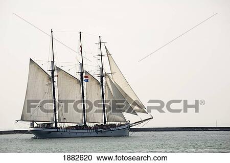 Stock Image - Tall Ship With Sails; Port Colborne, Ontario, Canada. Fotosearch