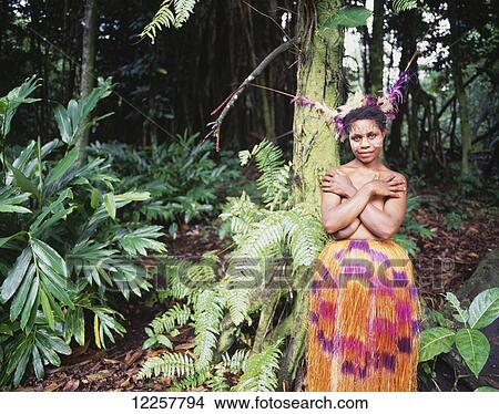 Picture - Tannese woman in traditional grass skirt; Tanna Island, Vanuatu. Fotosearch