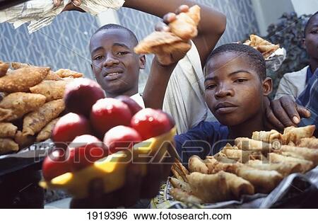 Stock Photograph - Tanzania Food Vendors At Coach Stops. Fotosearch