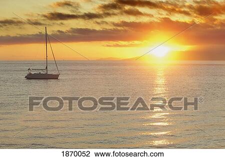 Tarifa, Cadiz, Andalusia, Spain; A Boat Sailing At Sunset View Large Photo Image Stock Image - Tarifa, Cadiz, Andalusia, Spain; A Boat Sailing At Sunset. Fotosearch