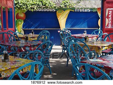 Stock Image - Tarifa, Cadiz, Andalusia, Spain; Tables And Chairs At A Restaurant At Punta Paloma Beach. Fotosearch
