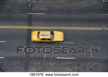 Taxi On 5Th Avenue In Midtown Manhattan View Large Photo Image Stock Photo - Taxi On 5Th Avenue In Midtown Manhattan. Fotosearch