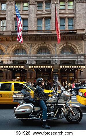 Stock Photograph - Taxis And Motorbike In Front Of Carnegie Hall, Manhattan, New York, Usa. Fotosearch