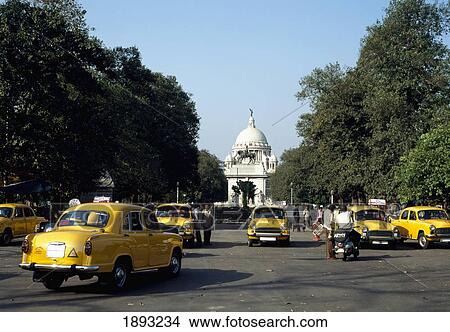 Taxis And Victoria Memorial View Large Photo Image Picture - Taxis And Victoria Memorial. Fotosearch
