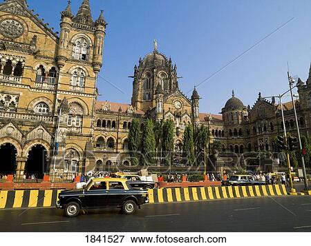 Taxis Driving On Street; Mumbai, India View Large Photo Image Stock Photo - Taxis Driving On Street; Mumbai, India. Fotosearch