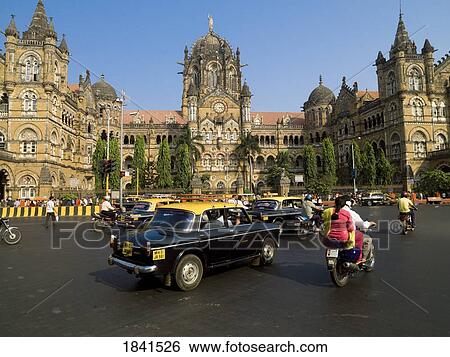 Taxis Driving On Street; Mumbai, India View Large Photo Image Stock Photograph - Taxis Driving On Street; Mumbai, India. Fotosearch