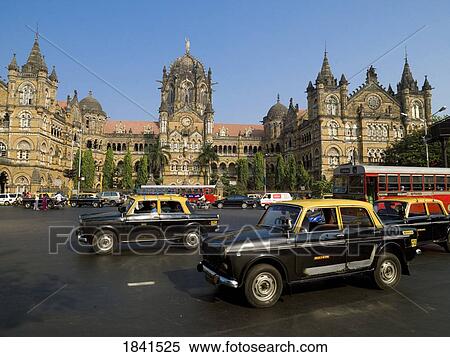 Stock Photography - Taxis Driving On Street; Mumbai, India. Fotosearch