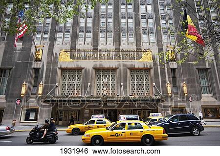 Taxis Passing By The Waldorf Astoria Hotel In Midtown Manhattan, New York, Usa View Large Photo Image Stock Photograph - Taxis Passing By The Waldorf Astoria Hotel In Midtown Manhattan, New York, Usa. Fotosearch