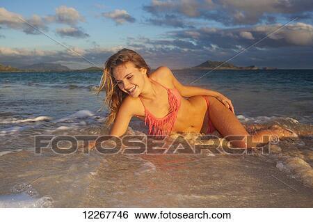 Teenage girl at the beach; Kailua, Island of Hawaii, Hawaii, United States of America View Large Photo Image Stock Photograph - Teenage girl at the beach; Kailua, Island of Hawaii, Hawaii, United States of America. Fotosearch