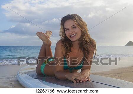Teenage girl with her paddle board; Kailua, Island of Hawaii, Hawaii, United States of America View Large Photo Image Stock Photograph - Teenage girl with her paddle board; Kailua, Island of Hawaii, Hawaii, United States of America. Fotosearch