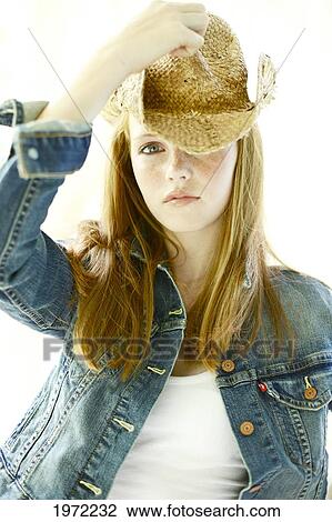 Teenage Girl With Red Hair And Freckles Models Her Denim Fashion In The Studio. View Large Photo Image Stock Image - Teenage Girl With Red Hair And Freckles Models Her Denim Fashion In The Studio.. Fotosearch