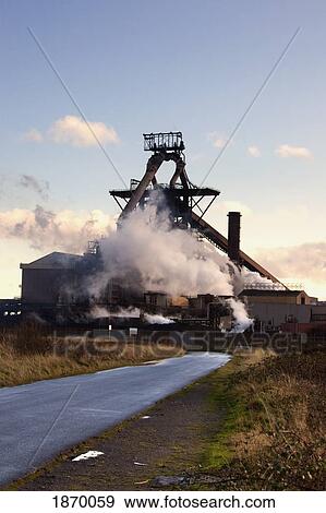 Stock Photo - Teesside, England; Steam Coming From A Refinery. Fotosearch