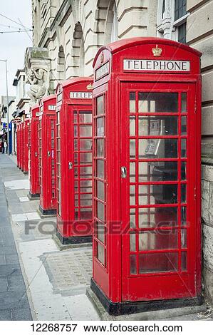 Stock Photo - Telephone boxes in a row; Blackpool, Lancashire, England. Fotosearch