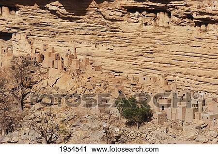 Stock Image - Tellem houses set in the Bandiagara Escarpment, Irelli, Mali. Fotosearch