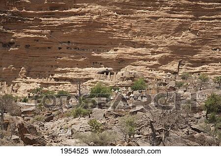 Tellem houses set in the Bandiagara Escarpment, Irelli, Mali View Large Photo Image Stock Photography - Tellem houses set in the Bandiagara Escarpment, Irelli, Mali. Fotosearch