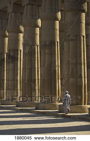 Stock Photography - Temple Guard Walking Past Columns In Court Of Amenophis Iii. Fotosearch