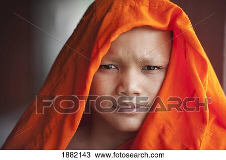 Stock Image - Temple Novice; Wieng Wai, Fang, Thailand. Fotosearch