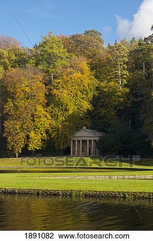 Stock Image - Temple Of Piety And Water Gardens In Studley Royal Park; North Yorkshire, England. Fotosearch
