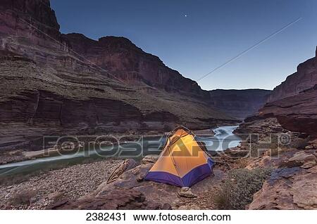 Tent camped on a ledge above Blacktail camp along the Colorado River, Grand Canyon National Park; Arizona, United States of America View Large Photo Image Stock Image - Tent camped on a ledge above Blacktail camp along the Colorado River, Grand Canyon National Park; Arizona, United States of America. Fotosearch