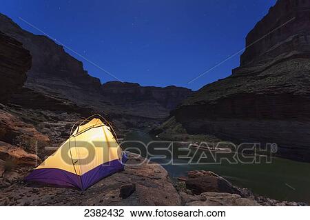 Tent camped on a ledge above Blacktail camp along the Colorado River, Grand Canyon National Park; Arizona, United States of America View Large Photo Image Stock Image - Tent camped on a ledge above Blacktail camp along the Colorado River, Grand Canyon National Park; Arizona, United States of America. Fotosearch