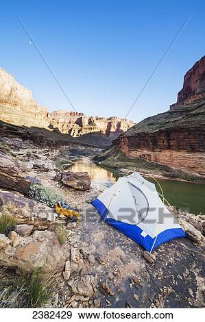 Tent camped on a ledge above Blacktail camp along the Colorado River, Grand Canyon National Park; Arizona, United States of America View Large Photo Image Stock Photo - Tent camped on a ledge above Blacktail camp along the Colorado River, Grand Canyon National Park; Arizona, United States of America. Fotosearch
