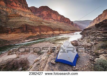 Stock Photo - Tented camp on a ledge above Blacktail camp along the Colorado River, Grand Canyon National Park; Arizona, United States of America. Fotosearch