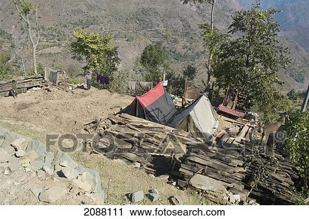 Tents By A Home Destroyed By The 8 October 2005 Earthquake, As Seen From The Chikar To Saran Road, Azad Kashmir, Pakistan View Large Photo Image Stock Image - Tents By A Home Destroyed By The 8 October 2005 Earthquake, As Seen From The Chikar To Saran Road, Azad Kashmir, Pakistan. Fotosearch