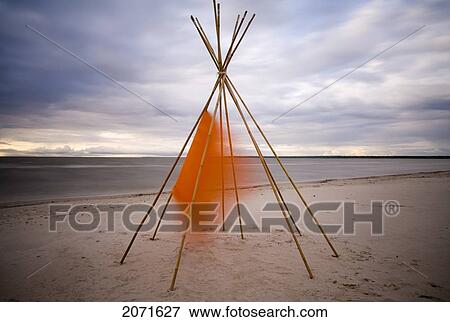 Stock Photo - Tepee Cover Blowing In Wind, Grand Beach, Manitoba. Fotosearch