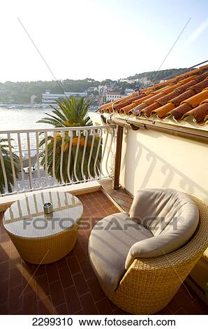 Terrace of superior room with an ocean view, Hotel Riva; Hvar, Croatia View Large Photo Image Stock Image - Terrace of superior room with an ocean view, Hotel Riva; Hvar, Croatia. Fotosearch