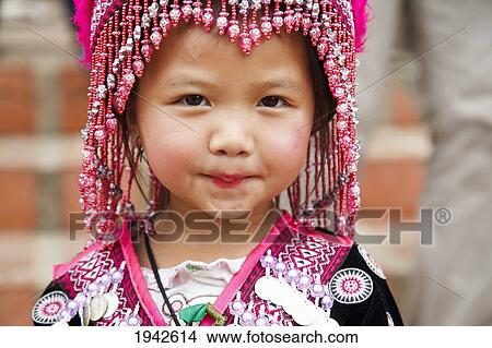 Thai Child In Traditional Dress; Chiang Mai Thailand View Large Photo Image Picture - Thai Child In Traditional Dress; Chiang Mai Thailand. Fotosearch