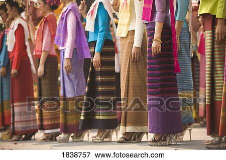 Thai Women In Traditional Dresses In New Year Festival, Low Section; Chiang Mai, Thailand View Large Photo Image Stock Photo - Thai Women In Traditional Dresses In New Year Festival, Low Section; Chiang Mai, Thailand. Fotosearch