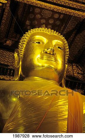Thailand, Ayuthaya, Close-Up Of Gold Buddha Head And Bust; Wat Panam Chong View Large Photo Image Stock Photo - Thailand, Ayuthaya, Close-Up Of Gold Buddha Head And Bust; Wat Panam Chong. Fotosearch