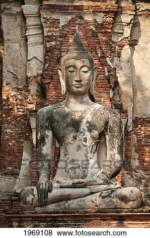 Stock Photo - Thailand, Ayuttaya, Buddha Statue At Wat Mahathat Buddhist Temple Ruins.. Fotosearch