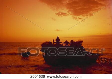 Thailand, Bali Overview Taneh Lot Temple Silhouetted At Sunset, Orange Sky Ocean View Large Photo Image Stock Photograph - Thailand, Bali Overview Taneh Lot Temple Silhouetted At Sunset, Orange Sky Ocean. Fotosearch