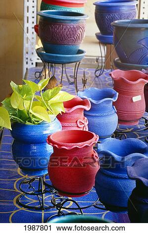 Stock Image - Thailand, Bangkok, Outdoor Market Selling Colorful Handmade Pottery. Fotosearch
