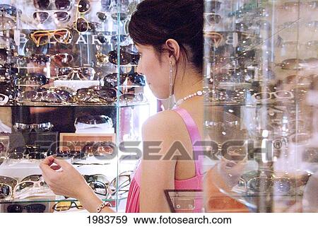 Stock Photo - Thailand, Bangkok, Thai Teenager Shopping.. Fotosearch