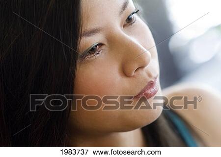 Stock Photo - Thailand, Bangkok, Thai Woman, Close-Up Of Face.. Fotosearch