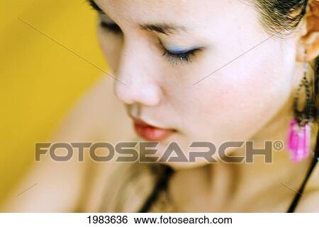 Thailand, Bangkok, Thai Woman, Close-Up Of Face. View Large Photo Image Stock Photograph - Thailand, Bangkok, Thai Woman, Close-Up Of Face.. Fotosearch